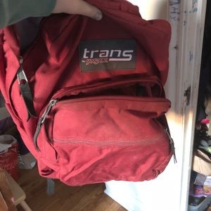 Jan-sport maroon back pack.